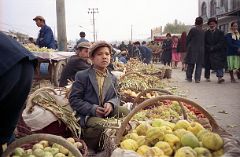 42 Kashgar Sunday Market 1993 Young Boy Selling Vegetables